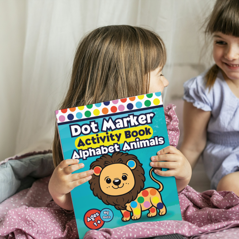 Dot Marker Activity Book - Alphabet Animals Child holding a Dot Marker Activity Book - Alphabet Animals. It has a cartoon Lion covered in dots with a green background.